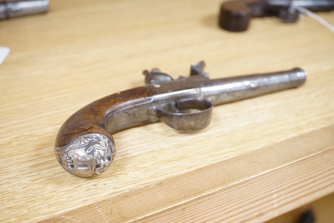 A Queen Anne style box lock flintlock travelling pistol, with turn off cannon barrel, 6cm, frame engraved; T. Lane, sliding trigger guard safety, rounded walnut grip with silver wire inlay and grotesque silver butt cap (
